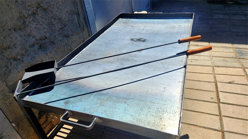 Parrilla de hierro flotante con plancha para dos fuegos, foto 2